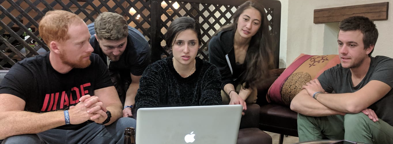A group of the author's friends play Ryan Quest during the last pre-release test